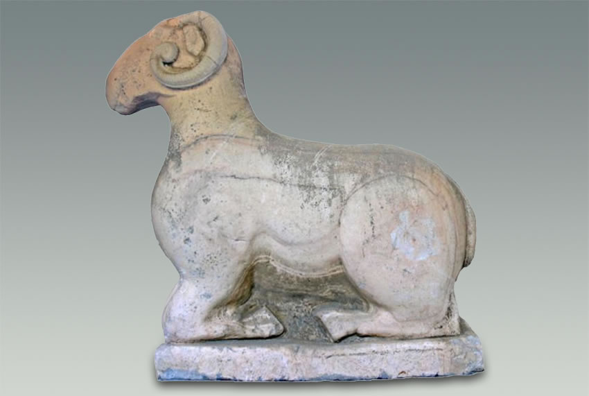 The white marble kneeling sheep